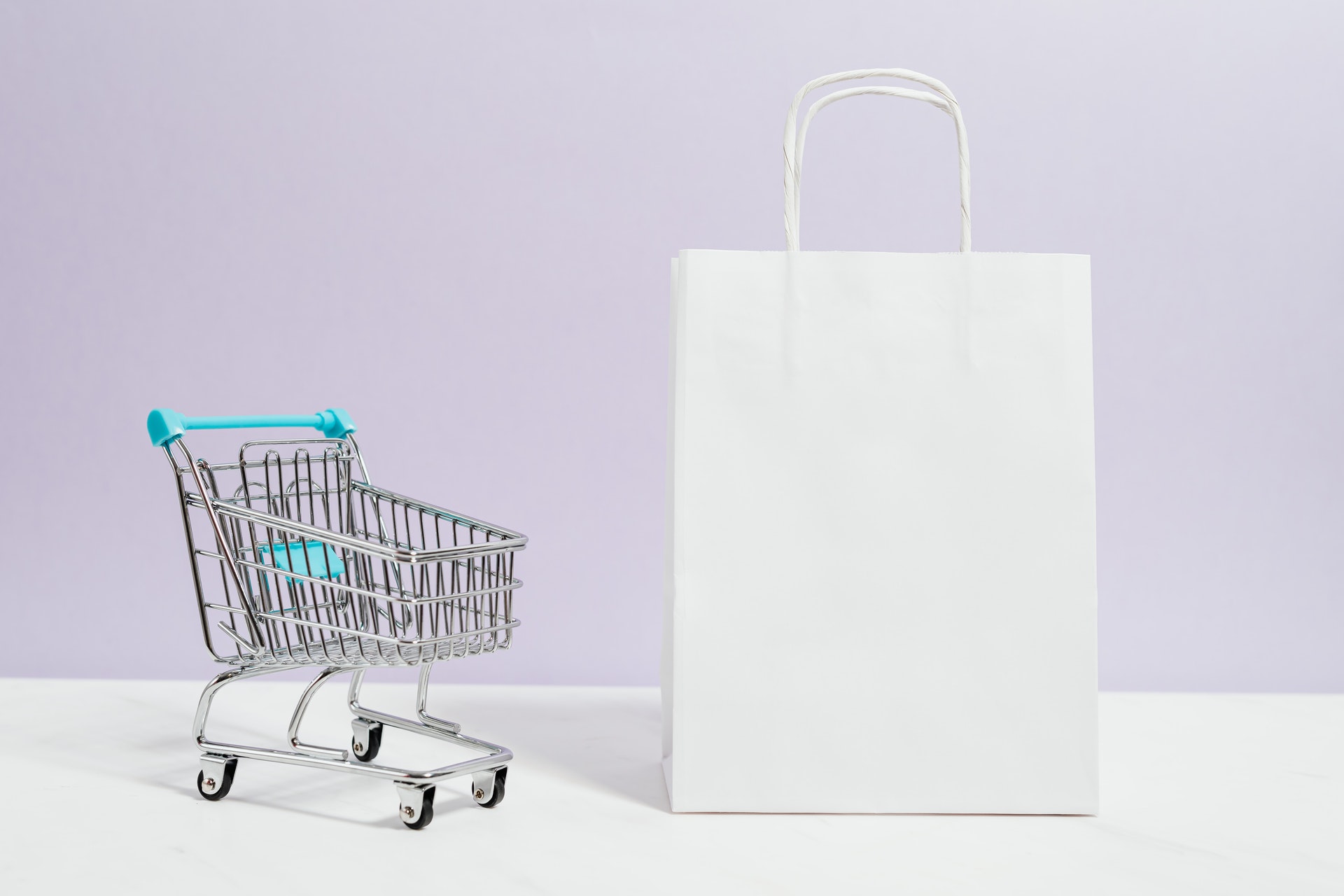 A small cart and a white bag